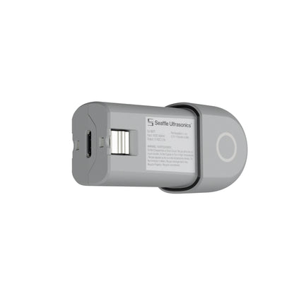 Gray electronic battery with Seattle Ultrasonics branding on a white background