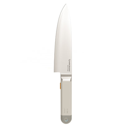 Chef's knife with a white handle on a white background