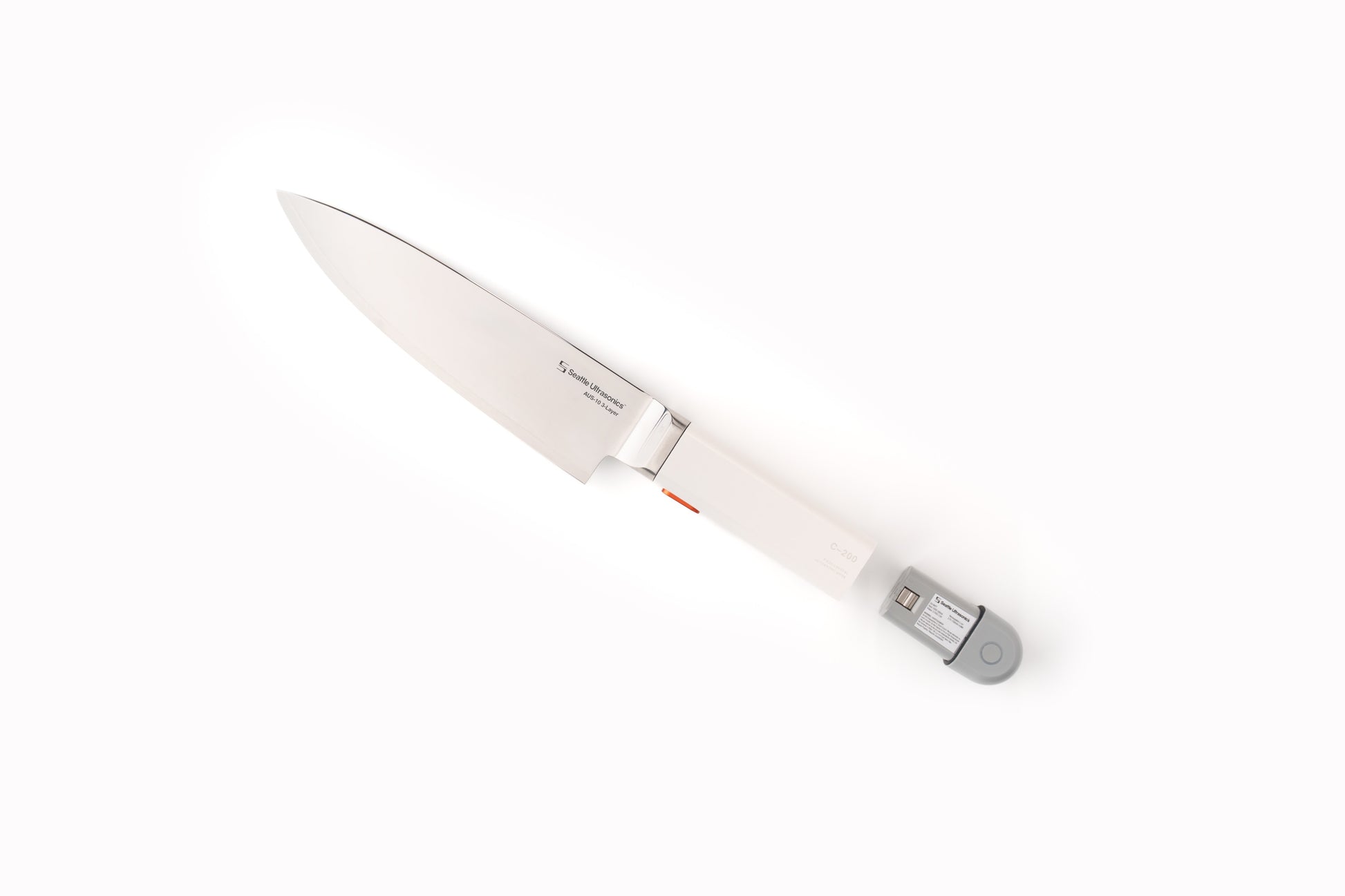 White knife with a silver blade on a white background