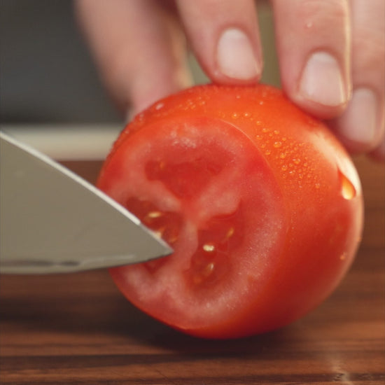An ultrasonic knife cutting various foods