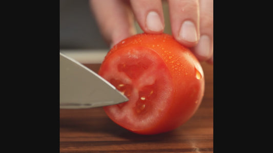 An ultrasonic knife cutting various foods